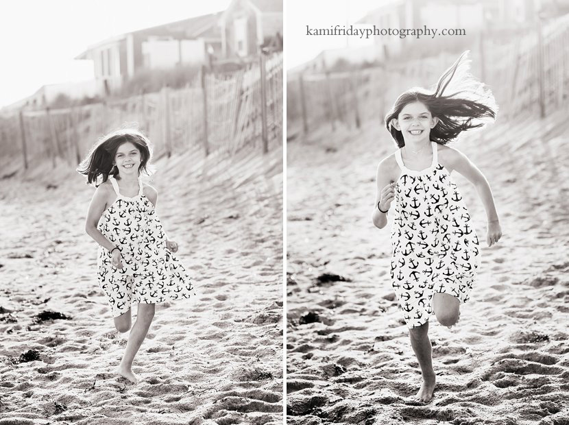 Girl running in the sand on Cape Cod beach