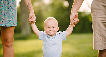 Boy poses for first birthday portrait at Mack's Apples in Londonderry