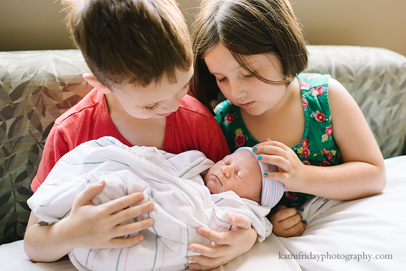 NH Siblings hold baby brother for the first time at St. Joseph hospital in Nashua.