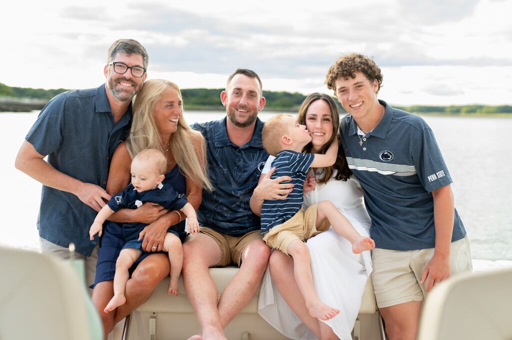 Kennebunkport ME Family casually poses for photos on their boat