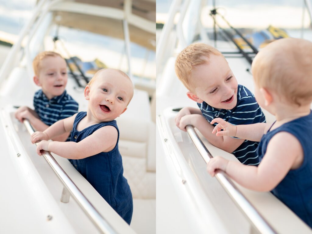 Two brothers play on their Kennebunkport ME boat while photographer Kami Friday captures their smiles.