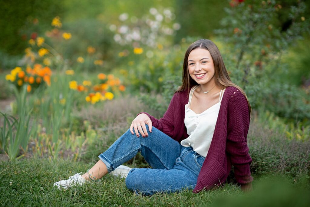 Nashua High Senior poses in field of wildflowers at Beaver Brook