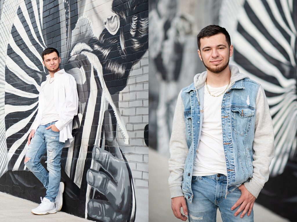 Nashua North senior in front of downtown Nashua NH mural